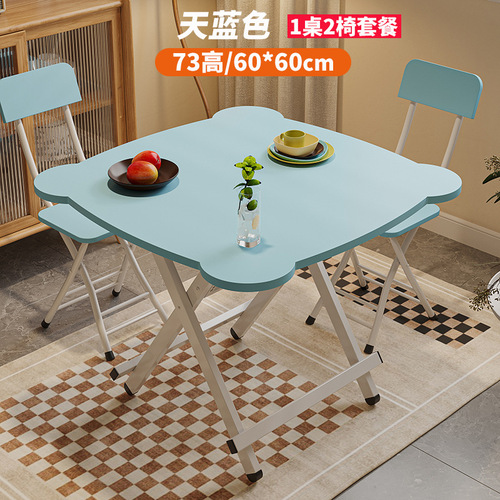 A foldable dining table for home use, suitable for small spaces, minimalist design, with matching chairs, outdoor foldable square table.