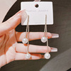 Small design long sophisticated earrings with tassels from pearl, trend of season, wholesale