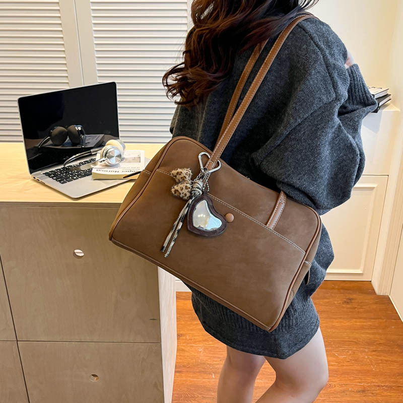 Bolsa de bolos de alta sensación para mujeres otoño / invierno 2025 nueva gran capacidad de transporte de hombro bolsa de mano bolsa de almacenamiento