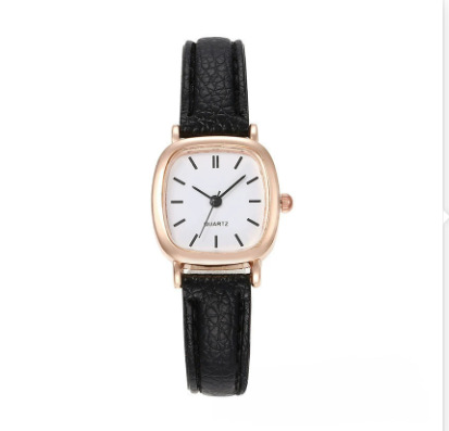 Belt—black belt with rose gold shell and white noodle nails