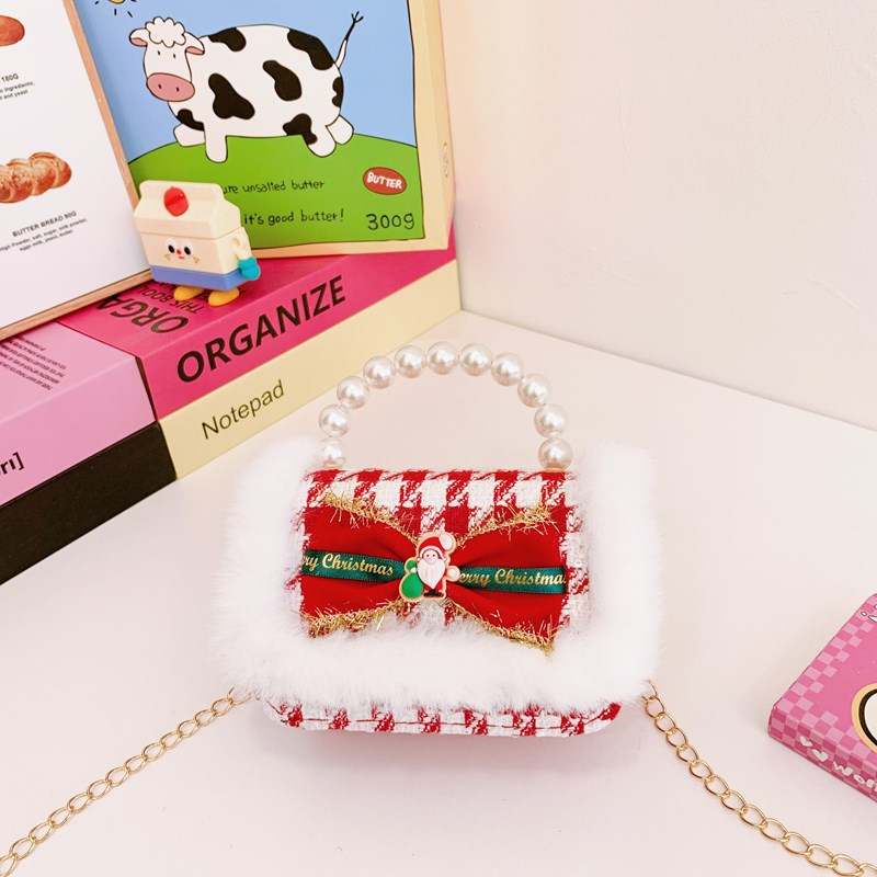 Nuevo bolso de hombro de niñas lindo arco bolso de perla bebé 2025 bolso rojo pequeño viento perfumado bolso para niños