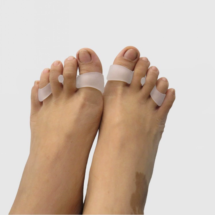 Новая улитка с пятью отверстиями для ног подкладки выворачиваются, чтобы выворачивать, коррекция накладки, отсоединенные в форме молотка, изогнутые и деформированные пальцы ног
