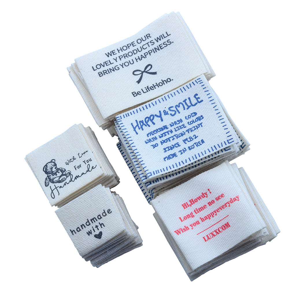 純綿印唄手作りDIY部品プリントアニメ水洗いマーク綿帯子供服織り唄商標卸売り