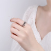 Trend zirconium, one size ring, silver 925 sample, on index finger