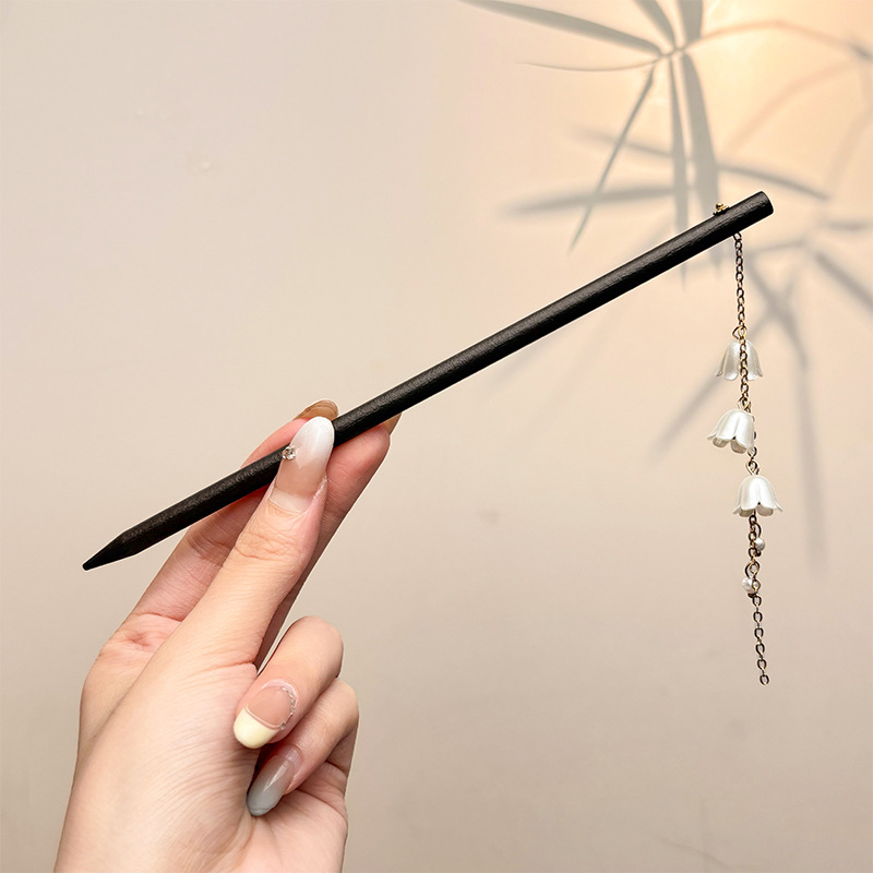 Nueva horquilla china 2025 nuevo estilo estilo antiguo horquilla mujer falda de cara de caballo de alta calidad estilo nacional horquilla de madera paso a paso horquilla tocado