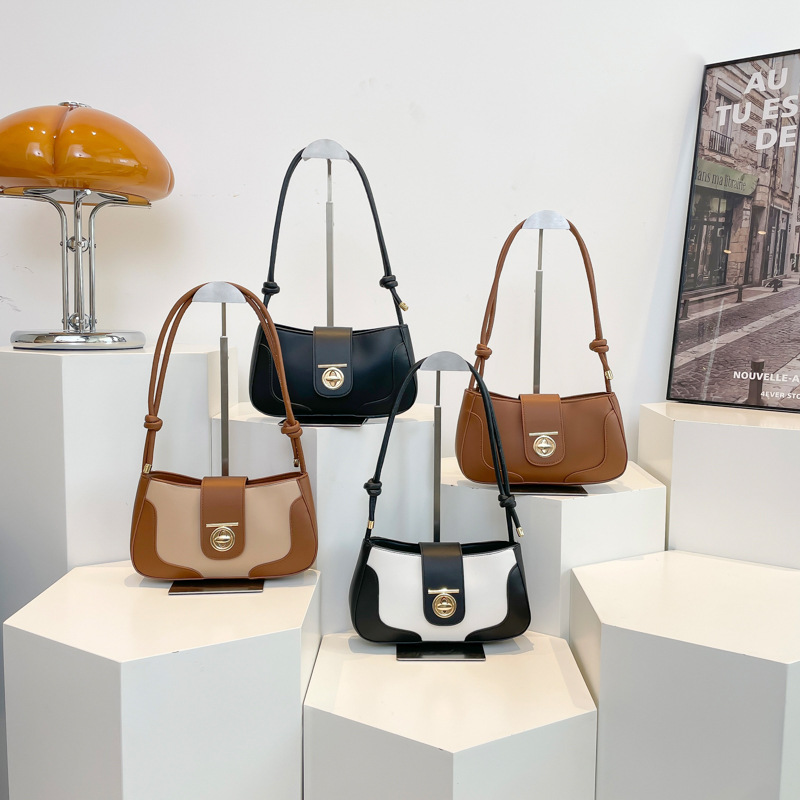 Bolsos debajo de las axilas mujeres 2024 invierno nueva moda de nicho simple diseño de hombro bolso retrógrado bolso pequeño