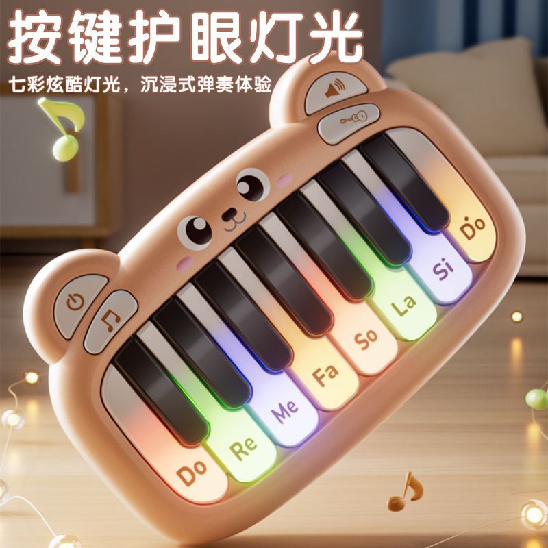 Cartoon Pocket Electronic Instruments Juguetes para niños Teclado mini luminoso Piano con altavoces de muñeca