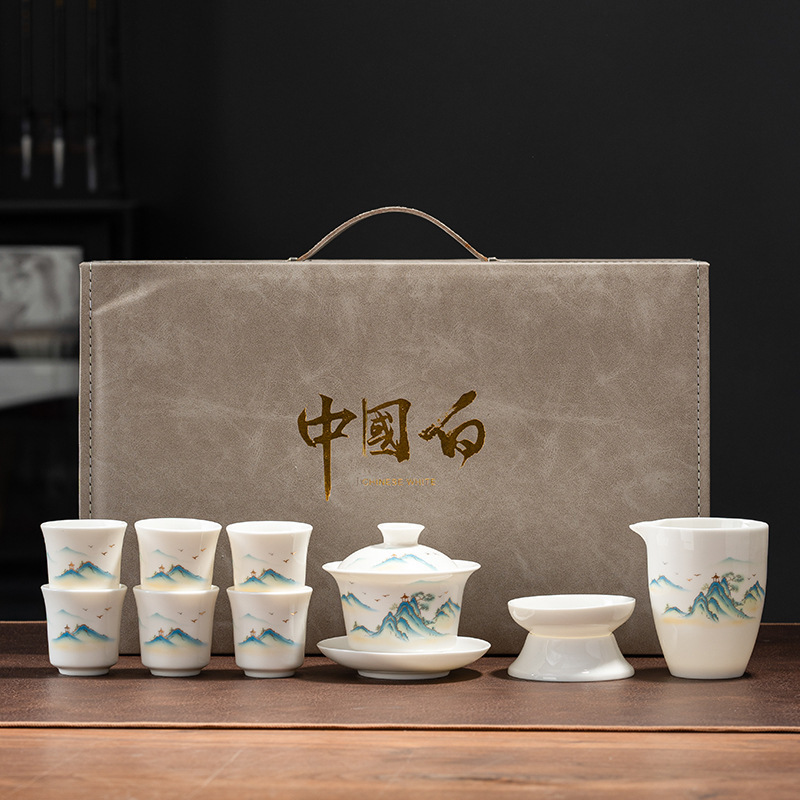 High-grade mutton jade white porcelain kung fu tea set suit set for home cover bowl tea cup gift box business companion gift