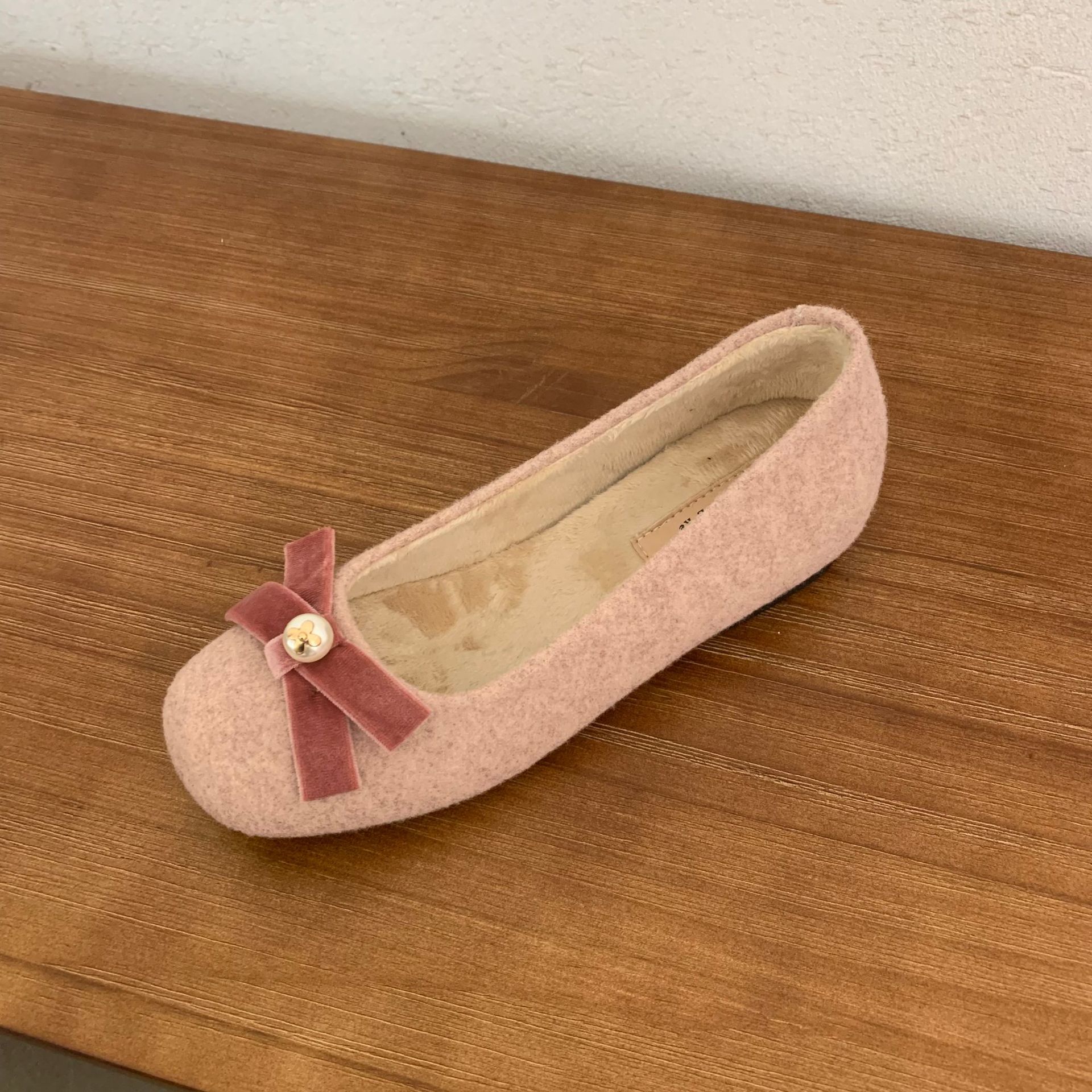 Chao Bunan suave hadas pequeñas fragancias viento Maria zapatos de invierno retrógrado 4CM arco de perla zapatos de una sola mujer