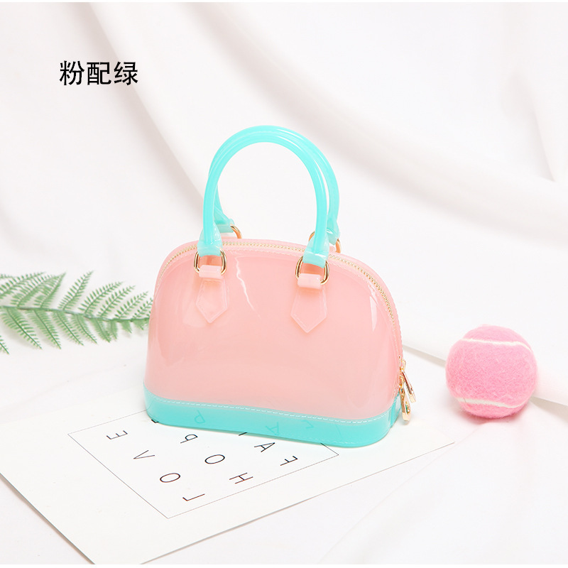 2025 primavera y verano estilo caliente moda casual niños dulces bolsa de gelatina mini bolso de mensajero de un solo hombro variedad al por mayor