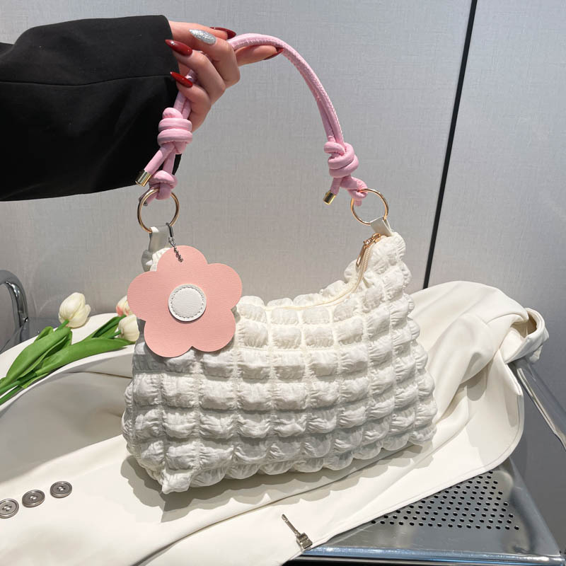 Bolso casual coreano de moda de gran capacidad plisada 2025 primavera nuevo estilo estilo estilo occidental bolso de axila de un solo hombro bolso de nube bolso femenino