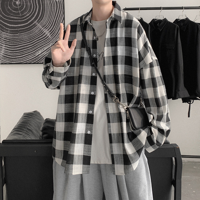 Camisa a cuadros estilo coreano Primavera de los hombres ins juventud camisa de manga larga 2021 suelta moda guapo abrigo del todo fósforo