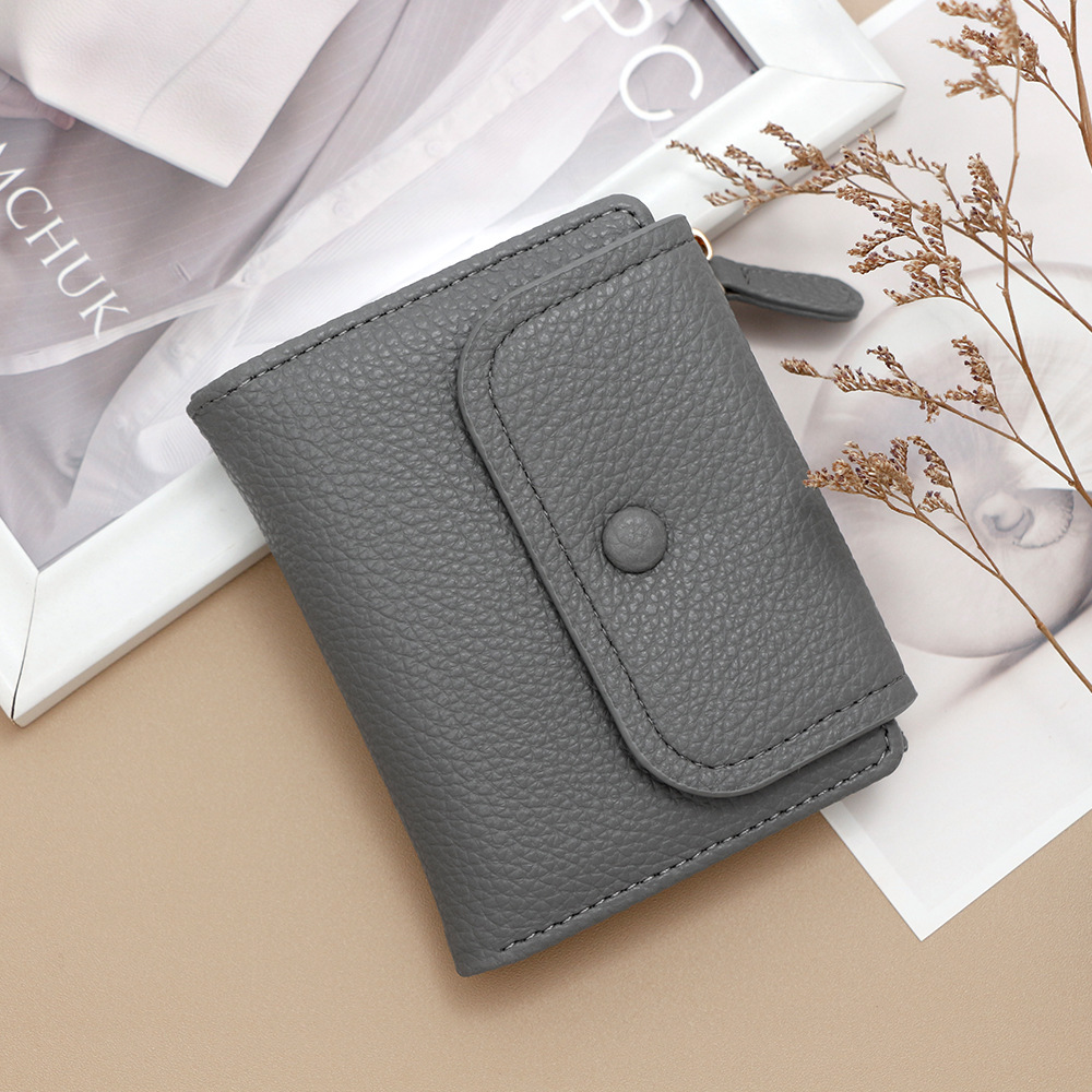 Nuevo cross-border cremallera bolso de cambio nicho creativo multifuncional bolso de tarjetas de moda litchi patrón corto para mujeres