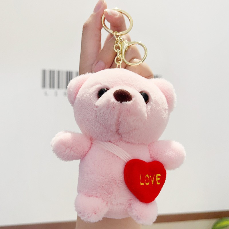 Cuatro pulgadas muñeca máquina colgante felpa llavero lindo muñeca mochila adornos grab máquina muñeca regalo al por mayor