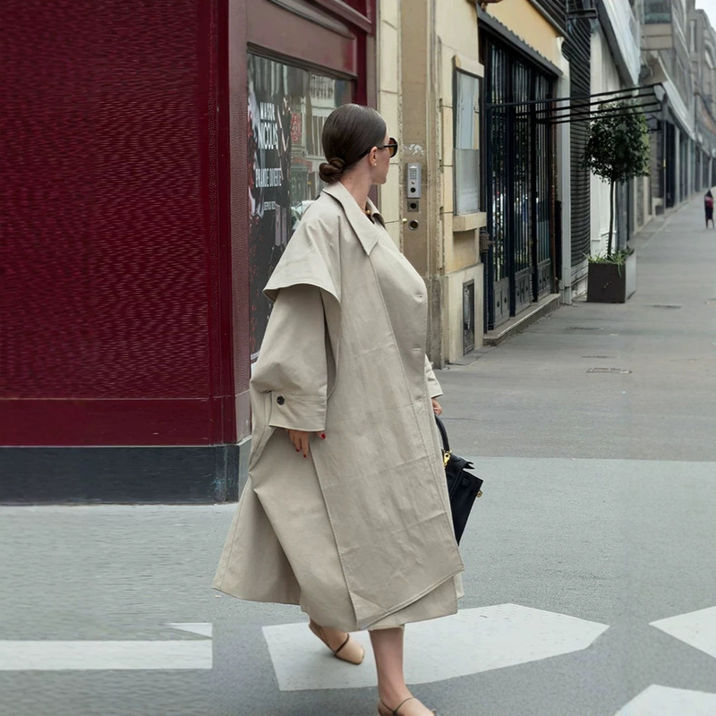 Cross-border women's clothing in old money style, oversized off-shoulder wide-sleeve long trench coat with back buttons, cape-style commuter long coat Cross-border women's clothing in old money style, oversized off-shoulder wide-sleeve long trench coat with back buttons, cape-style commuter long coat