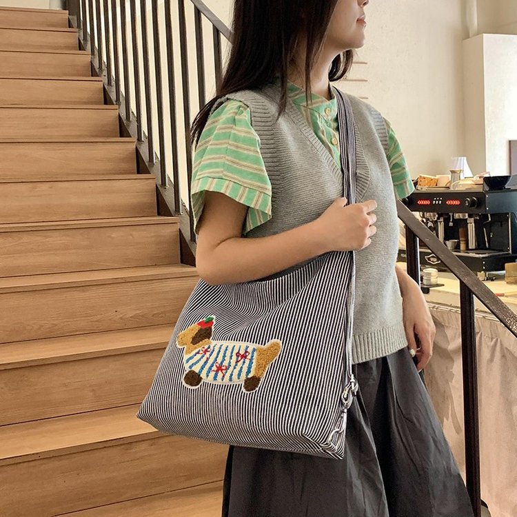 Ülipopulaarne niši ruuduline värvipliiatsiga koer naistele 2024. aasta uus mitmekülgne õlakott kaenlaaluste jaoks, ämbrikott_voghion.com