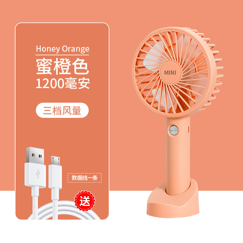 Ventilador portátil de carga USB portátil de escritorio de mano larga duración gran viento mini pequeño ventilador dormitorio de estudiantes