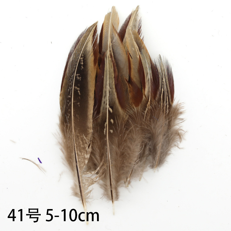 Fábrica al por mayor de bricolaje plumas pequeñas plumas naturales plumas de pollo salvaje plumas de pato jardín de infantes joyas hechas a mano gato divertido material de captura de sueños