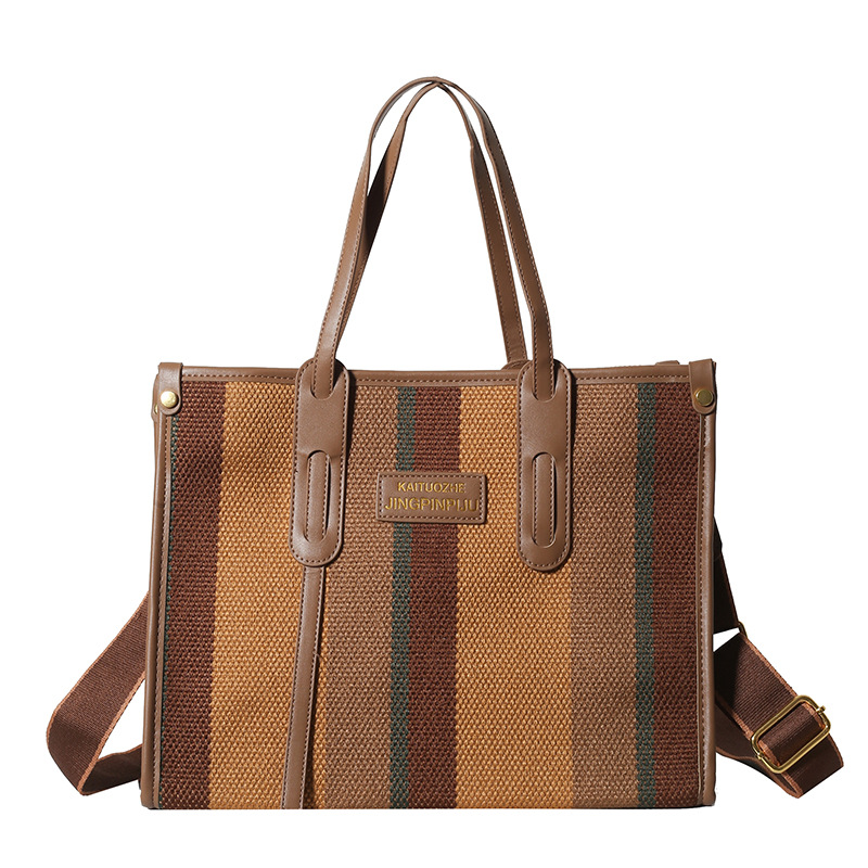 Bolso Tote portátil a rayas de color de contraste de lona para mujer 2024 nueva textura de moda transfronteriza bolso de mensajero de un solo hombro