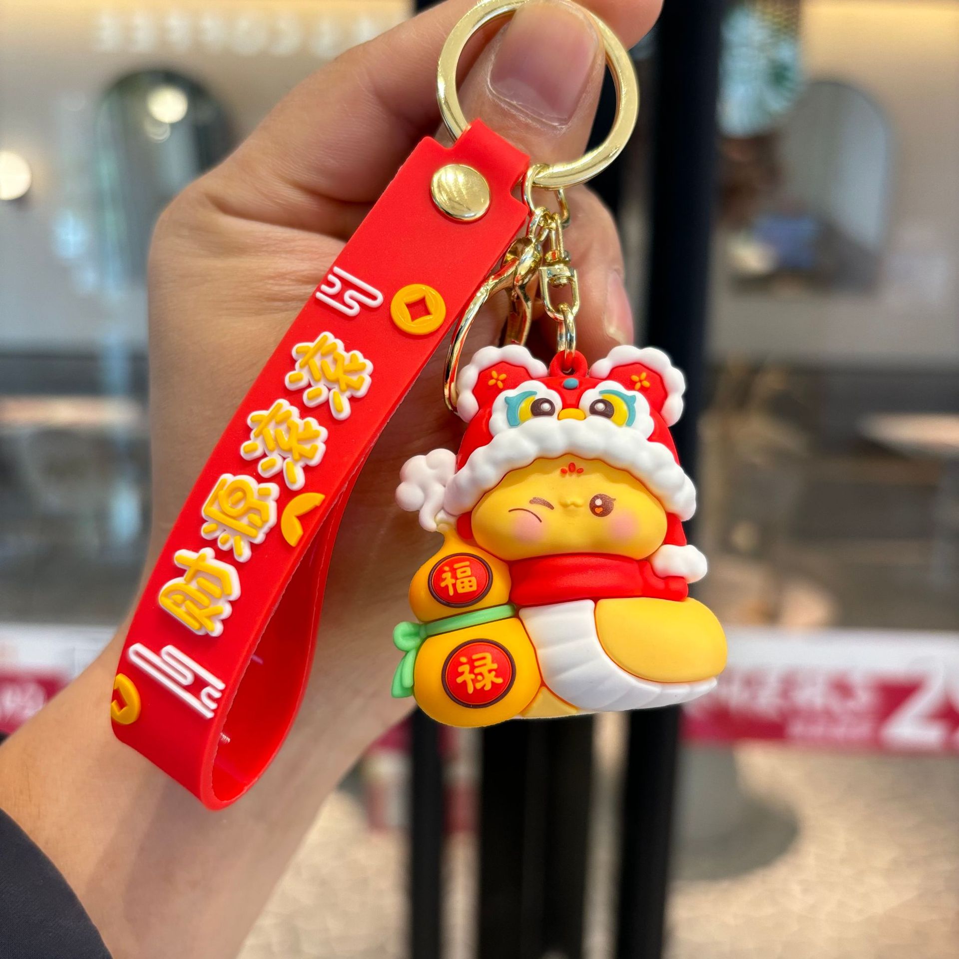 Año Nuevo adorable serpiente año zodiacal serpiente oro para atraer la fortuna muñeca tridimensional llavero de automóvil colgante atrapar regalos al por mayor