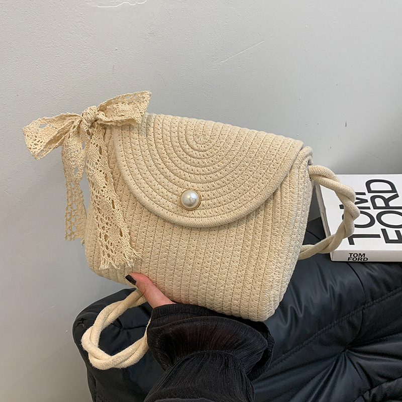 Bolso de tejido para mujeres 2024 nuevo verano cordón trenzado mochila de hombro bolso de hombro pequeño arco encantador