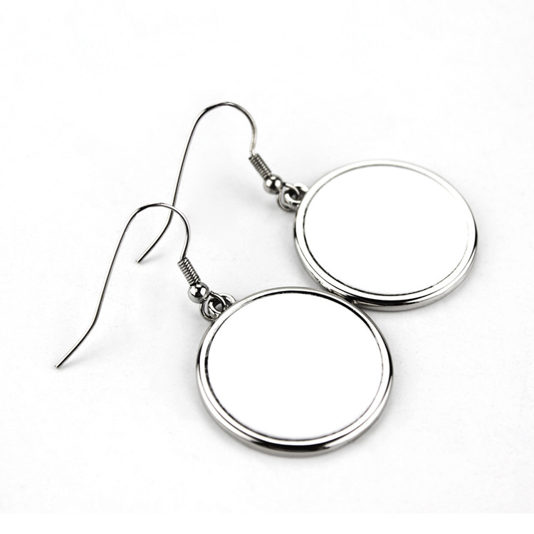 Fábrica directa transfronteriza pendientes de orejas de sublimación caliente colgante de orejas accesorios de material en blanco personalidad metálica pendientes redondos europeos y estadounidenses