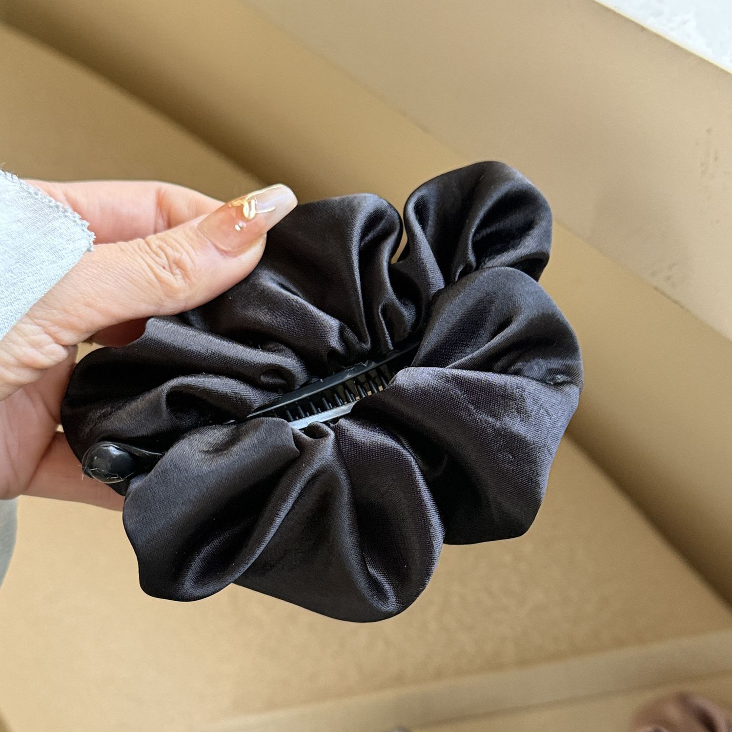1# black ruched banana clip, approximately 10cm
