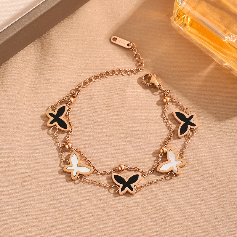 Estilo coreano blanco y negro Concha mariposa pulsera de oro rosa geométrica de doble capa pulsera de acero de titanio fábrica de joyas para niñas