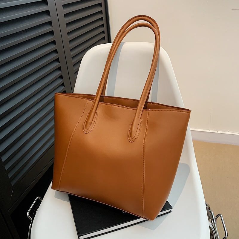 Bolsa de viaje para mujeres 2024 nueva bolsa de viaje de gran capacidad otoño alta sensación de bolso de hombro universal simple bolsa de clase
