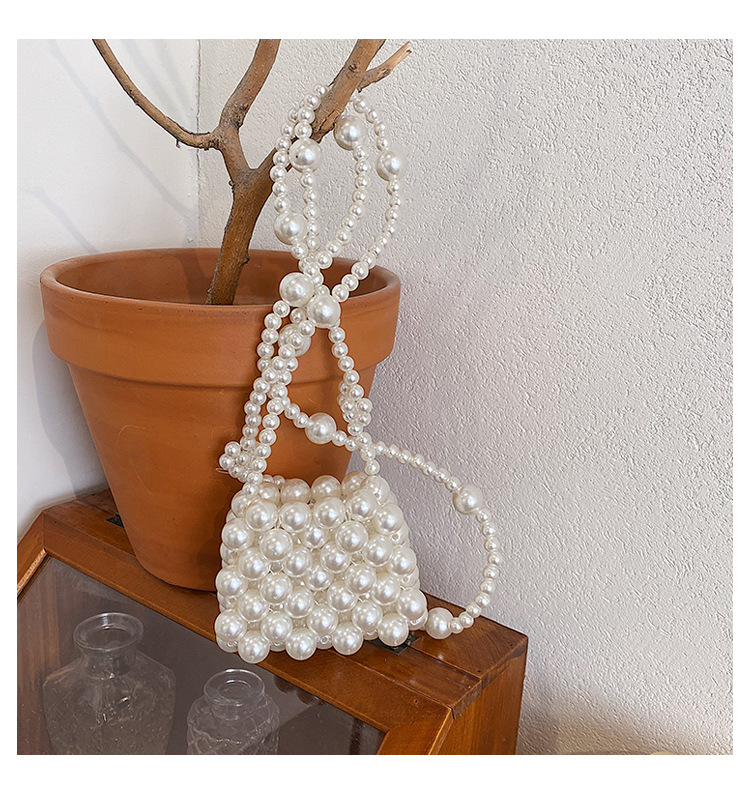 Geometric Pattern Cute Artificial Pearl Pearl Pull-belt Hollow Flower Shoulder Strap Large Pearl Flower Shoulder Strap Big Pearl Short Handheld Handbags display picture 6