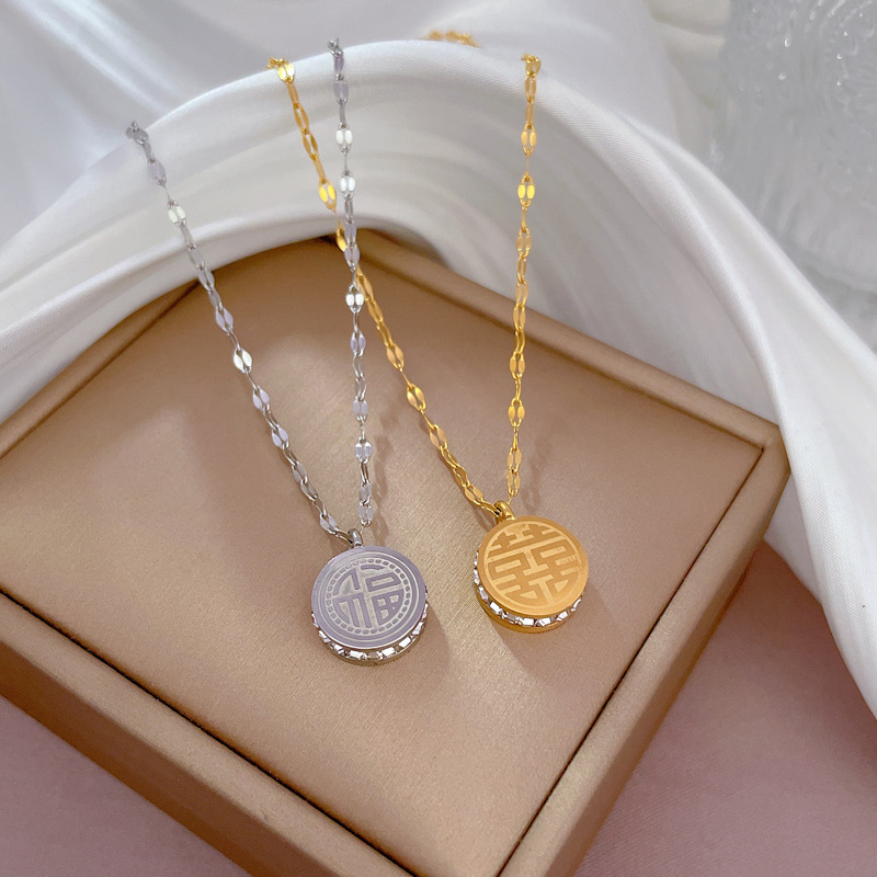 Collier femme symbole fu double face en or véritable bijoux_voghion.com