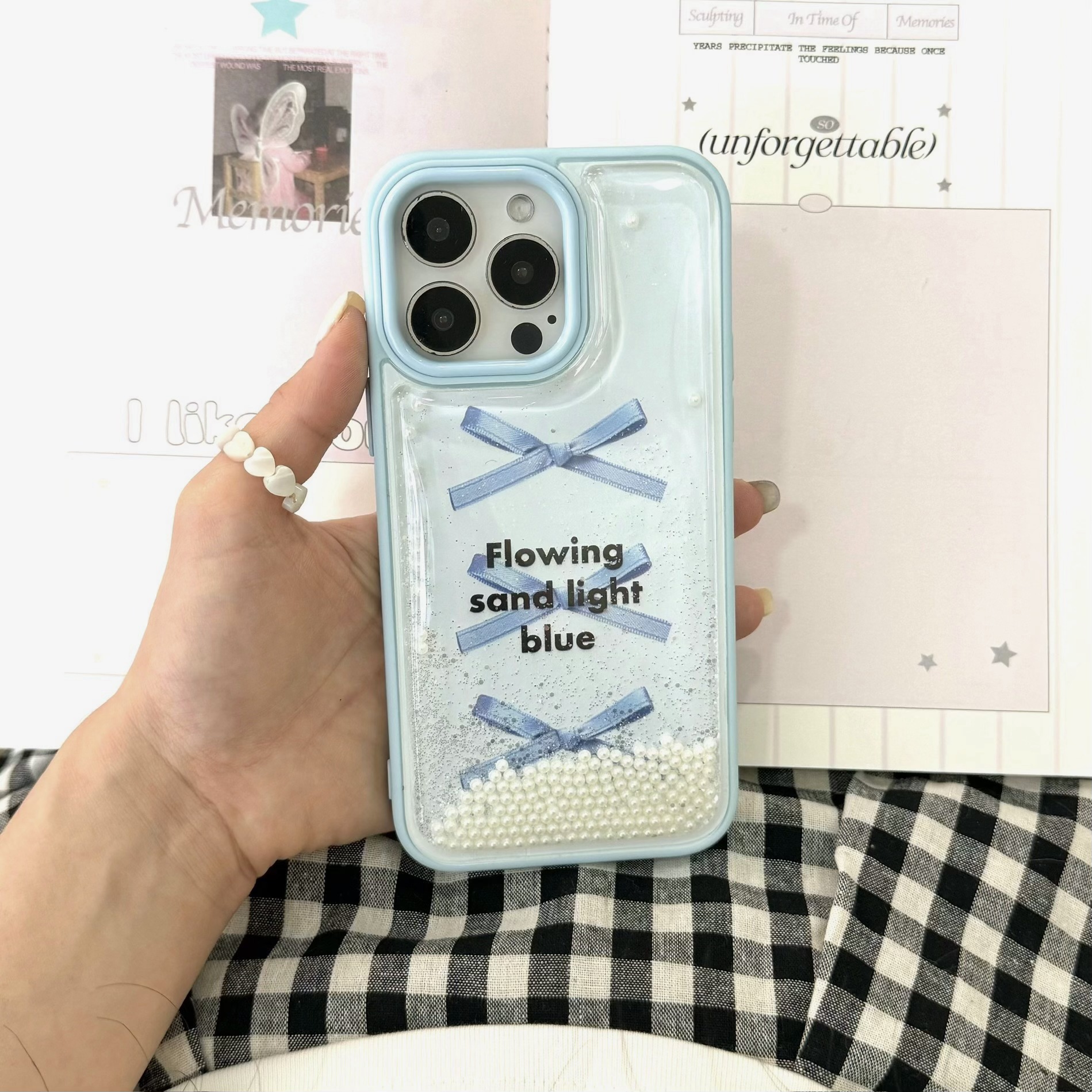 Arenas movedizas de perlas con lazo azul fresco para Apple 15ProMax funda para teléfono 16Pro Nuevo 14/13 Mujer