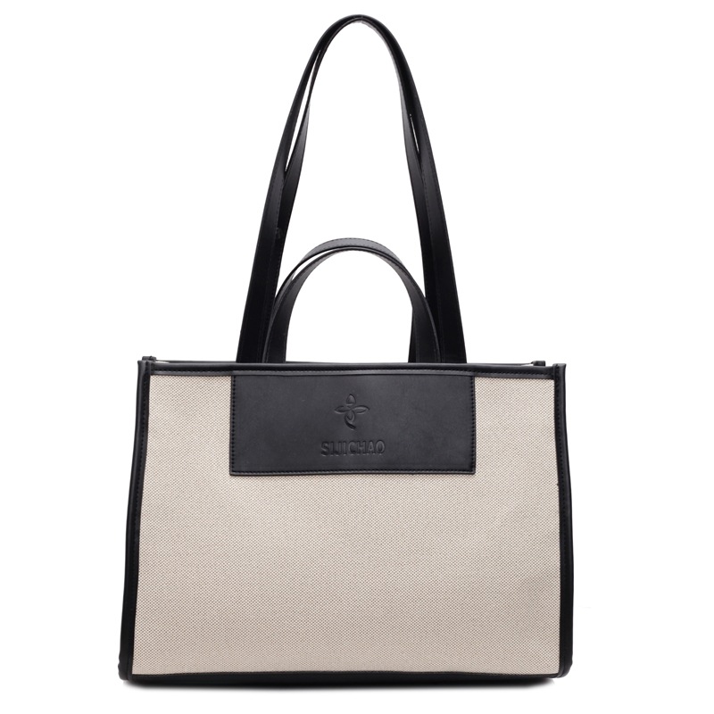 Bolsa de mano de lona de gran capacidad para mujeres caliente nueva moda simple alta textura mochila de viaje