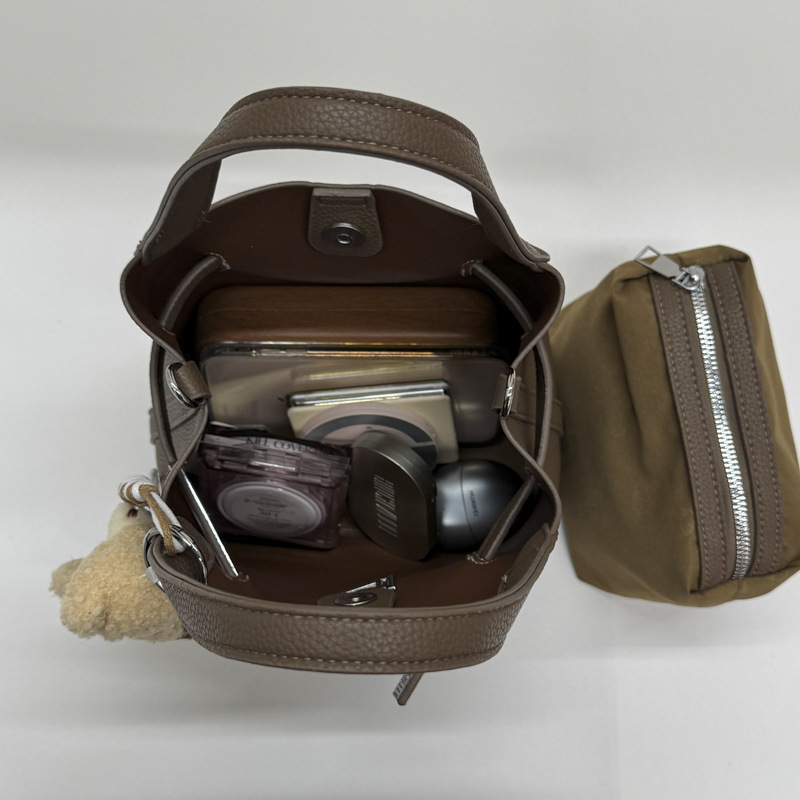 Bolsa de viaje coreana para niños y madres, bolso de balde de mano de mujer de alto nivel, bolso de lichi transfronterizo, bolso de Kelly, bolso de hombro