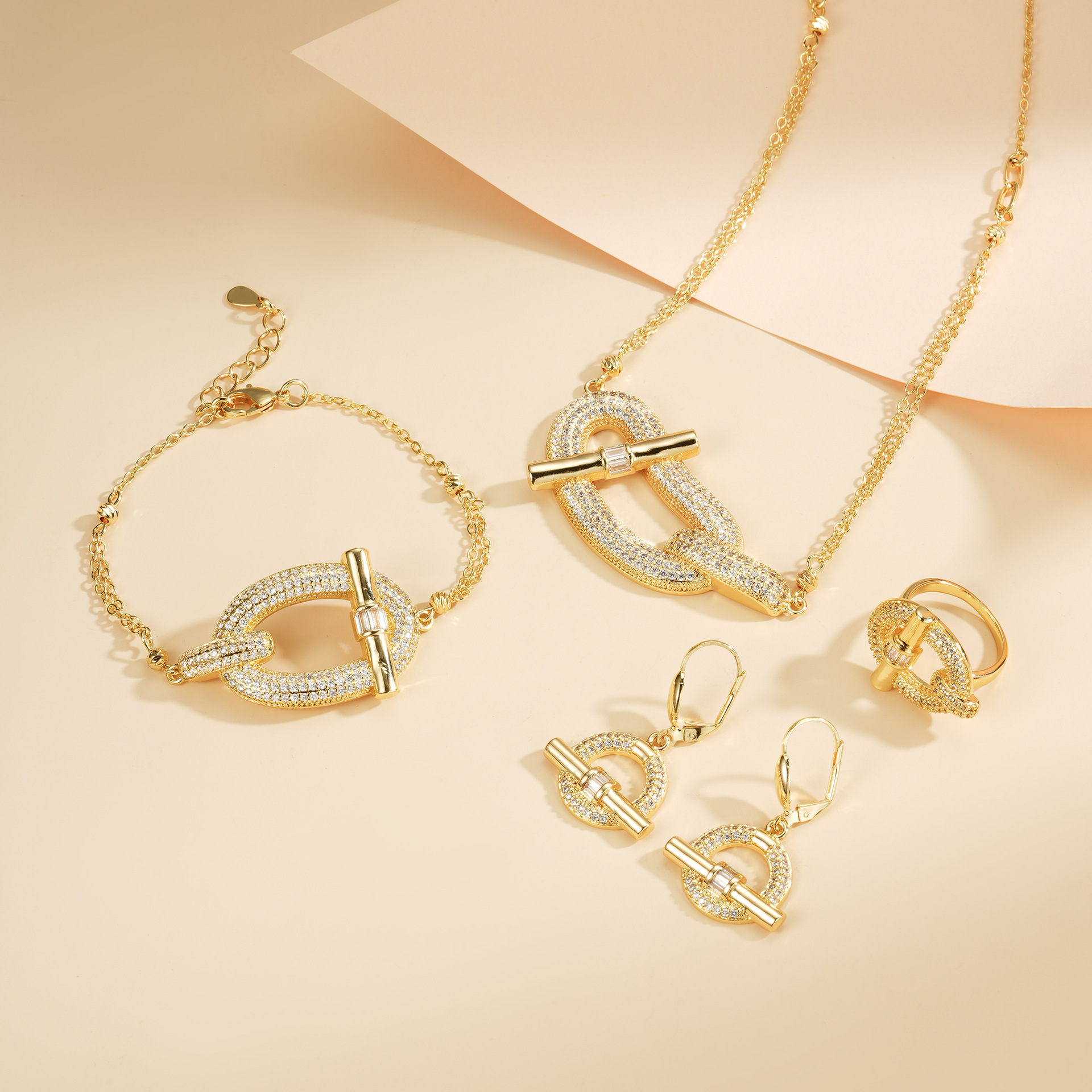 Joyería de moda europea y americana de alta gama cuatro piezas lujosa cruzada aretes clavículas anillo pulsera conjunto de joyas de piedra de silicio