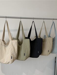 Capacious one-shoulder bag for men and women