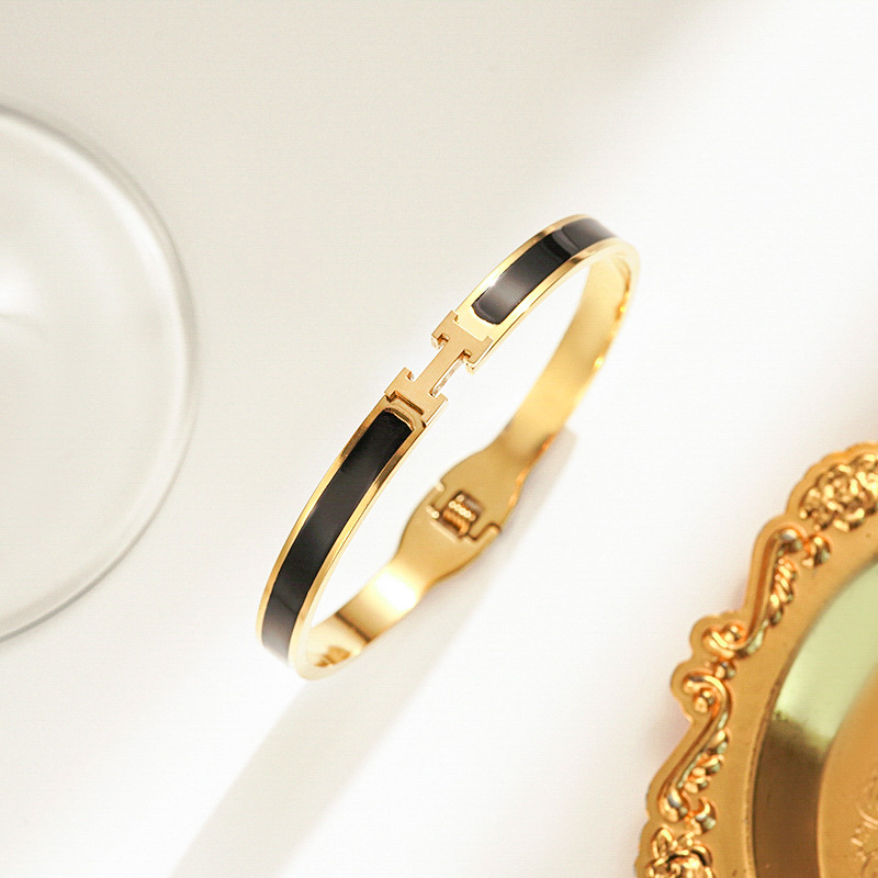 Gold and black bracelet