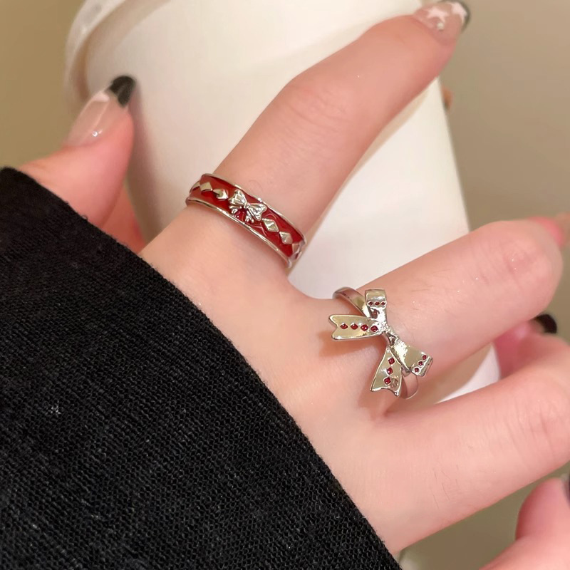 One size adjustable fashionable universal design ring with bow