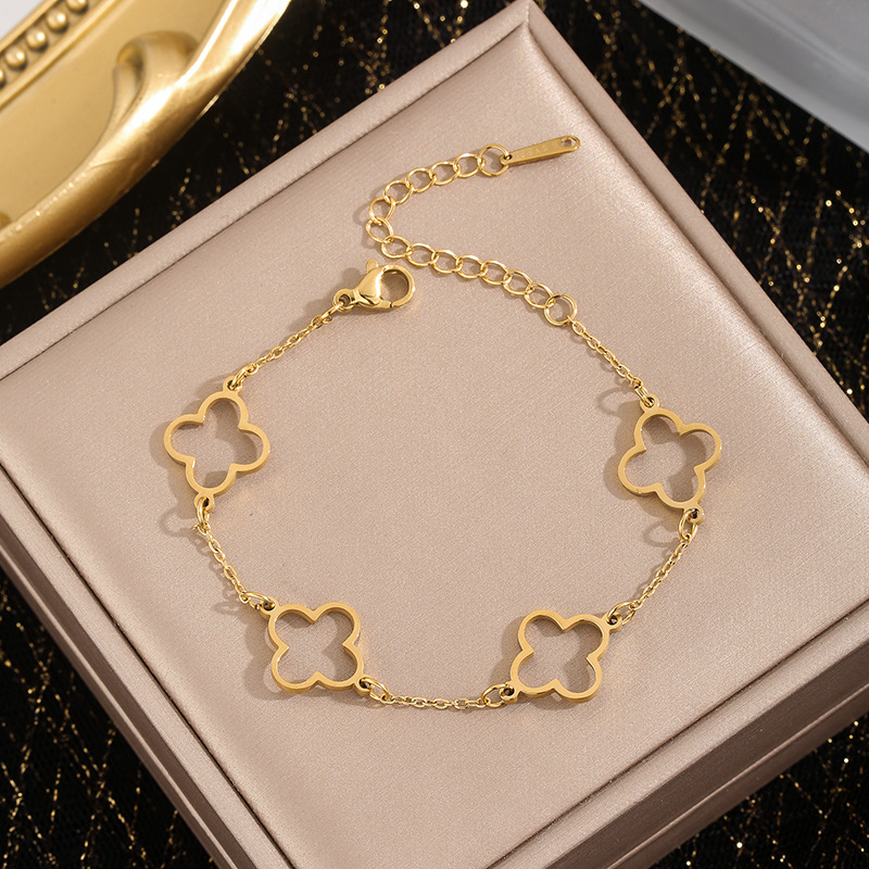 Cross-border simple fashion jewelry stainless steel 18K gold-plated niche Joker hollow four-leaf clover women's bracelet wholesale