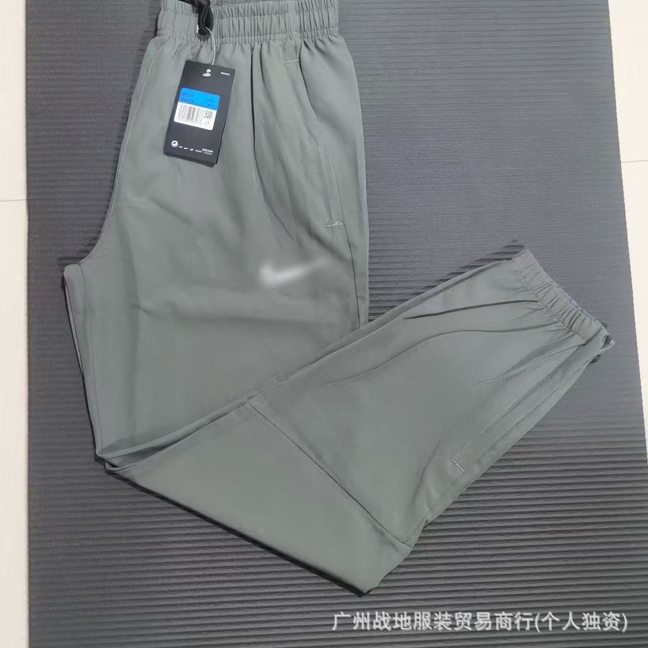 Explosión transfronteriza de un tipo idéntico de tecnología de prevención de tres secado rápido tela casual tela cremallera deportiva de protección solar pantalones de hombre