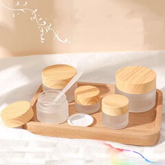 卸売木目蓋ガラスクリームボトルつや消しクリームボトルアイクリームボトル 30 グラムポータブル化粧品ボトル