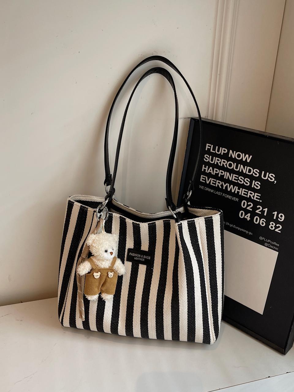 Bolso de lona para mujer de gran capacidad 2025 nuevo bolso de hombro a cuadros de todo fósforo moda casual bolso de alta gama de estilo coreano