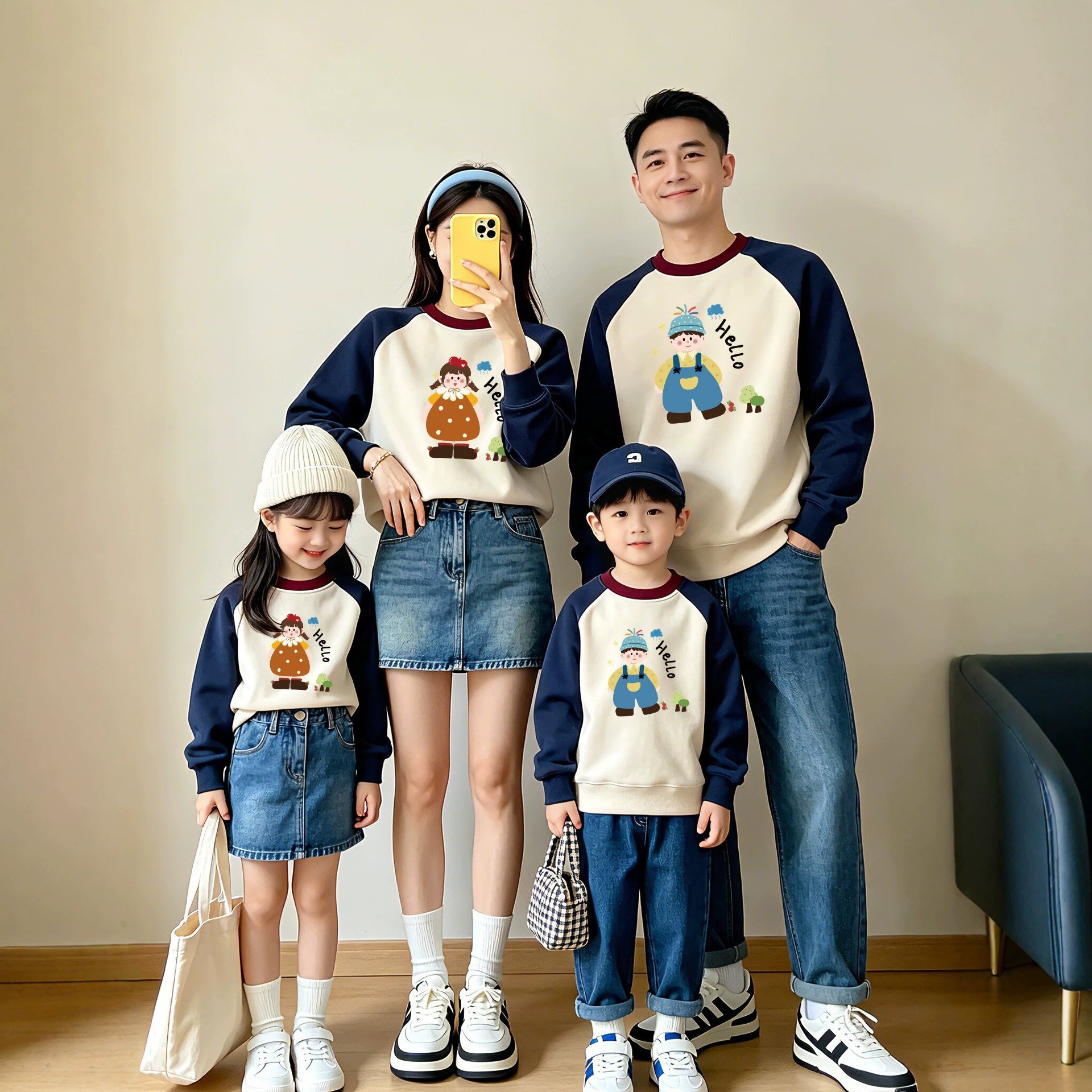 Korean-style color-blocking parent-child sweatshirts for a family of four, cartoon print, loose fit, suitable for family outings and family photos, versatile top