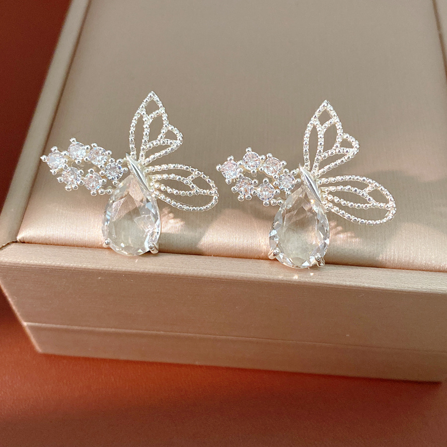 Agujas de plata, mariposas de piedra, gotas de agua, pernos huecos, nicho de moda, pendientes de lujo ligero, pendientes de alta calidad.