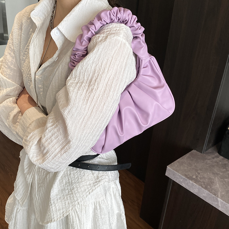 Versión coreana del bolso de axila de nicho 2025 primavera y verano nuevo bolso femenino casual bolso plisado neto del mismo estilo bolso de hombro marea