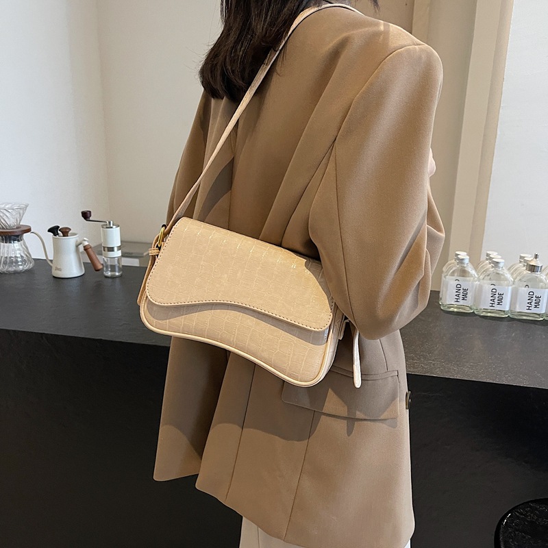 Bolso de textura transfronteriza 2025, nuevo bolso de hombro retro de piedra, piel esmaltada, bolso de moda de mujer