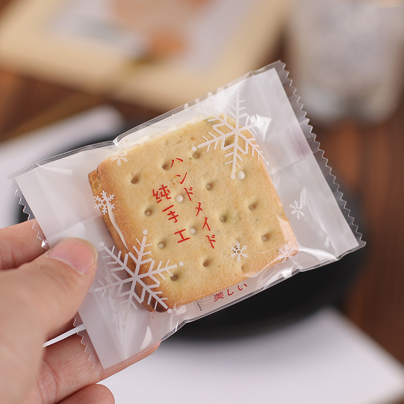 Nueva bolsa de embalaje crujiente de copo de nieve bolsa de dulces para hornear turrón máquina de galletas bolsa de sellado turrón leche Jujube bolsa de embalaje al por mayor