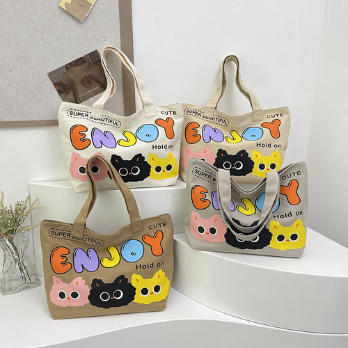 可爱卡通帆布单肩包包女字母印花托特包大容量通勤手提女包学生包