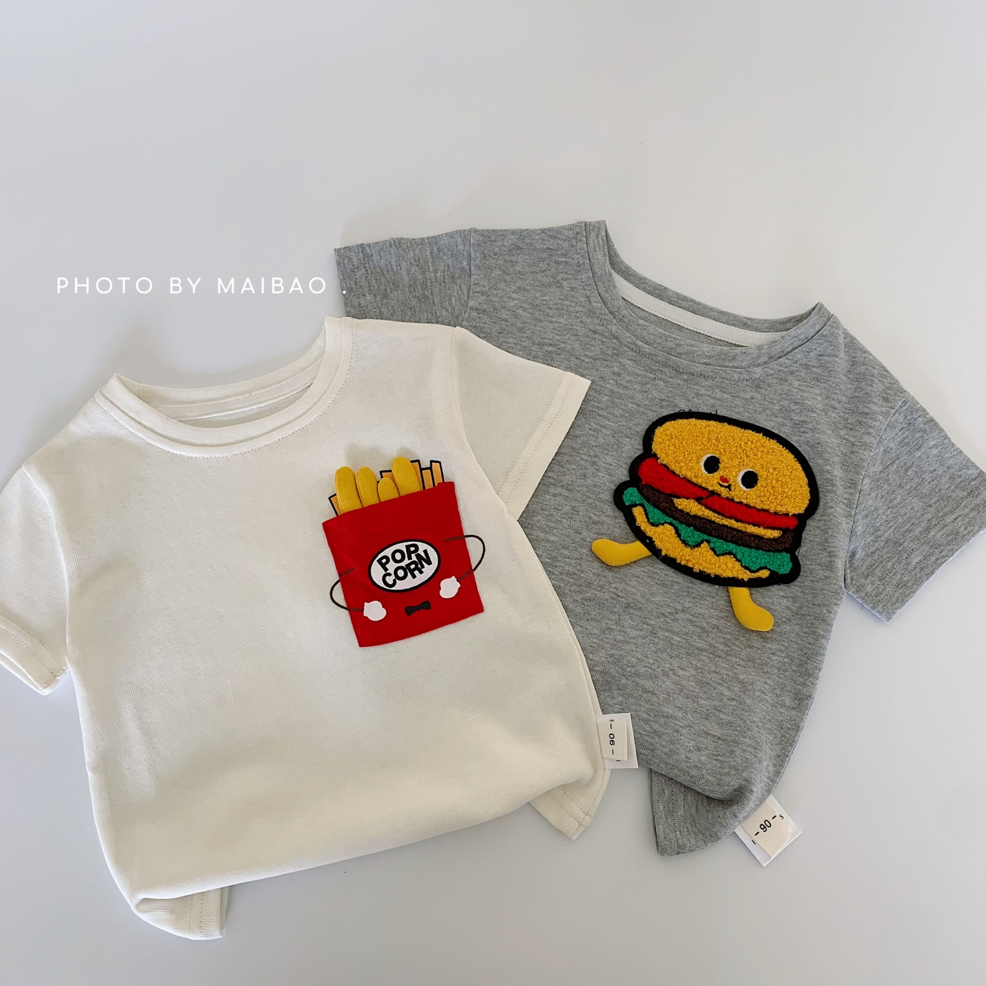 Camiseta de manga corta para niños Maibao 2025 nueva ropa para niños coreanos ropa para niños verano blusas de verano de media manga al por mayor