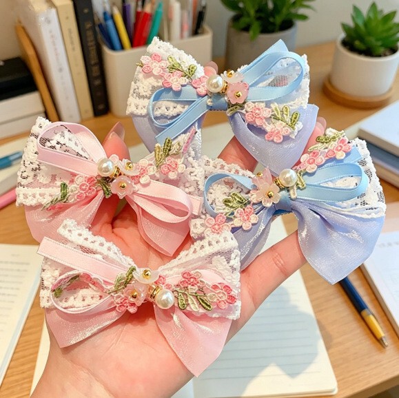 Children's hairgrip pearl with bow